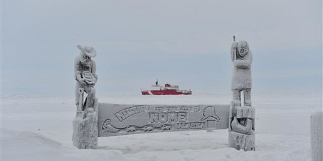 Jan. 14, 2012: This image provided by the U.S. Coast Guard shows the Coast Guard Ice Breaker Healy breaking ice near the city of Nome Alaska.
