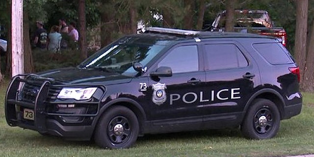 Police in North Royalton, Ohio, at the scene of a triple homicide Monday.