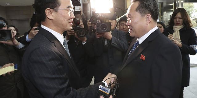 January 9, 2017: South Korean Unification Minister Cho Myoung-gyon, left, shakes hands with the head of North Korean delegation Ri Son Gwon before their meeting at the Panmunjom in the Demilitarized Zone in Paju, South Korea.