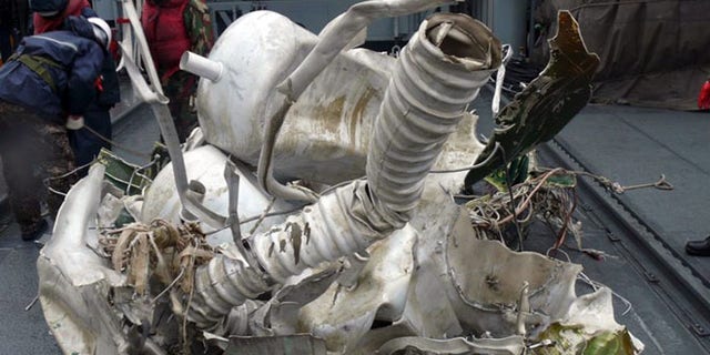 Dec. 23, 2012: In this undated photo released by South Korean Defense Ministry on, a part of debris from a rocket North Korea launched on Dec. 12, 2012 is seen on a South Korean navy vessel in the Yellow Sea, South Korea.