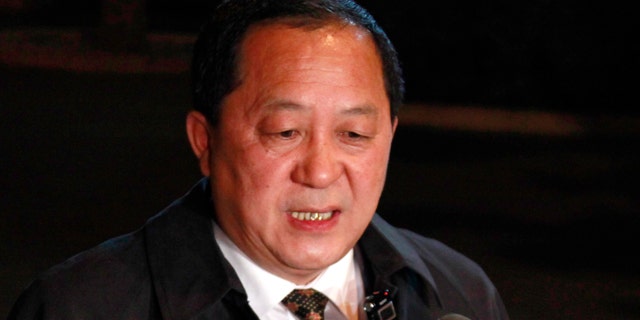 March 19, 2012: Ri Yong Ho, a vice minister of North Korea's Ministry of Foreignffairs, speaks to journalists gathered outside the Diaoyutai state guest house in Beijing.
