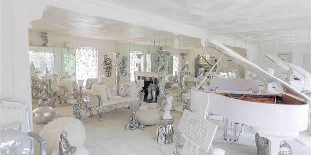 The home comes "as is," which includes a Kohler Campbell baby grand player piano.