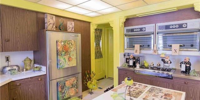 The listing boasts that the home comes with 1950s Frigidaire appliances.