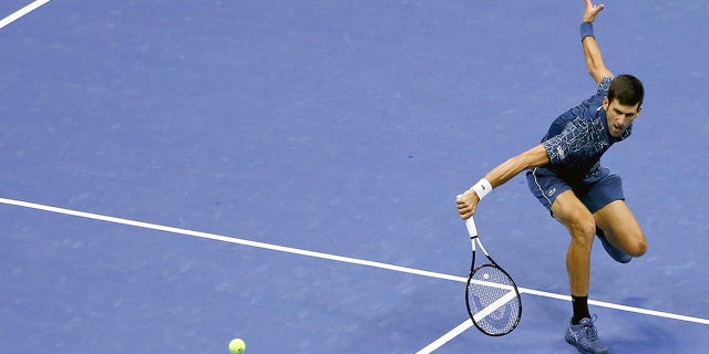 Novak Djokovic, of Serbia, returns a shot to Juan Martin del Potro, of Argentina, during the men's final of the U.S. Open tennis tournament, Sunday, Sept. 9, 2018, in New York. (AP Photo/Jason DeCrow)