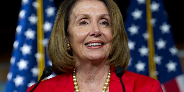 FILE - In this Sept. 6, 2018, file photo, House Minority Leader Nancy Pelosi, D-Calif., speaks during her weekly news conference on Capitol Hill in Washington. Consumer and health care groups say theyâre trying to block a move by the pharmaceutical industry to commandeer must-pass opioids epidemic legislation as a vehicle for rolling back drugmaker discounts to Medicare beneficiaries with high prescription costs. Republican leaders were saying little about behind-the-scenes discussions on Sept. 21,, but a spokesman for Pelosi calls it a âa multi-billion dollar handout to Big Pharma.â (AP Photo/Jose Luis Magana, File)