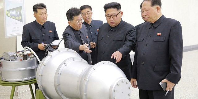 North Korean leader Kim Jong Un provides guidance with Ri Hong Sop (2nd L) and Hong Sung Mu (R) on a nuclear weapons program in this undated photo released by North Korea's Korean Central News Agency (KCNA) in Pyongyang September 3, 2017. KCNA via REUTERS ATTENTION EDITORS - THIS PICTURE WAS PROVIDED BY A THIRD PARTY. REUTERS IS UNABLE TO INDEPENDENTLY VERIFY THE AUTHENTICITY, CONTENT, LOCATION OR DATE OF THIS IMAGE. NOT FOR SALE FOR MARKETING OR ADVERTISING CAMPAIGNS. NO THIRD PARTY SALES. NOT FOR USE BY REUTERS THIRD PARTY DISTRIBUTORS. SOUTH KOREA OUT. NO COMMERCIAL OR EDITORIAL SALES IN SOUTH KOREA. THIS PICTURE IS DISTRIBUTED EXACTLY AS RECEIVED BY REUTERS, AS A SERVICE TO CLIENTS. TPX IMAGES OF THE DAY - RC18A8521C80
