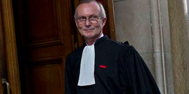 March 29, 2012: French nuclear physicist Adlene Hicheur's lawyer Patrick Baudoin is seen at the Paris courthouse, in Paris where Hicheur goes on trial charged with criminal association as part of a terrorist enterprise.