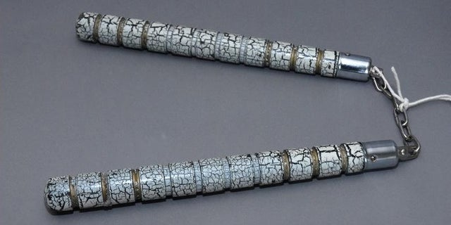 A California town is set to equip its police officers with nunchucks. (Press Association via AP Images)