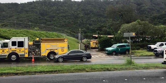 Emergency crews gather near the Nuuanu Reservoir in Oahu, Hawaii.