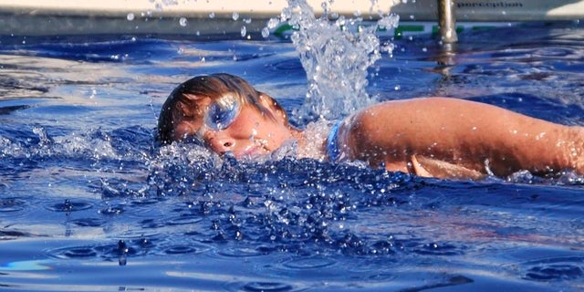 Aug. 19, 2012: In this photo provided by Diana Nyad via the Florida Keys News Bureau, endurance swimmer Diana Nyad swims in the Florida Straits between Cuba and the Florida Keys. Nyad is endeavoring to become the first swimmer to transit the Florida Straits from Cuba to the Keys without a shark cage.