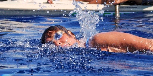 Aug. 19, 2012: In this photo provided by Diana Nyad via the Florida Keys News Bureau, endurance swimmer Diana Nyad swims in the Florida Straits between Cuba and the Florida Keys. Nyad is endeavoring to become the first swimmer to transit the Florida Straits from Cuba to the Keys without a shark cage.