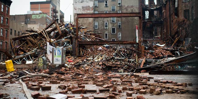 March 27, 2015: A pile of debris remains at the site of a building explosion in the East Village neighborhood of New York.