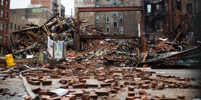 March 27, 2015: A pile of debris remains at the site of a building explosion in the East Village neighborhood of New York.