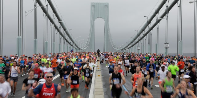 The first wave of runners make their way across the Verrazano-Narrows Bridge during the start of the New York City Marathon in New York, U.S., November 5, 2017.