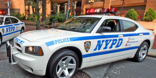 The new police cruisers, a 2006 Dodge Charger, are on display at New York City Police Department's headquarters in New York, Monday, Aug. 14, 2006. Police Commissioner Raymond Kelly unveiled the new police cruiser during a news conference Monday. (AP Photo/Mary Altaffer)