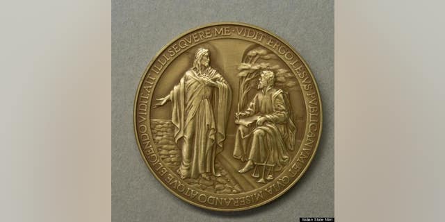 A commemorative medallion to mark the first year of Pope Francis' papacy has been recalled because it misspelled the word 'Jesus.'