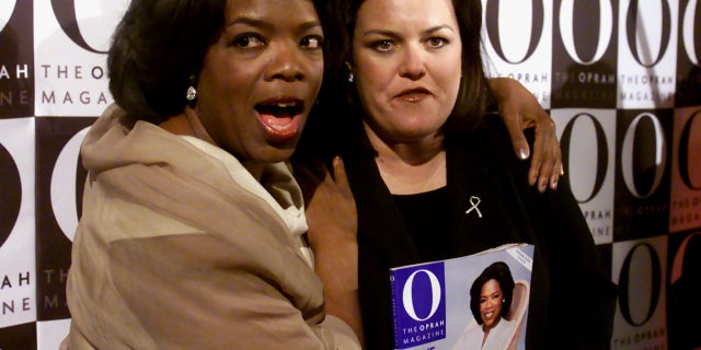 Oprah Winfrey with Rosie O'Donnell, who holds a copy of "O, the Oprah Magazine."