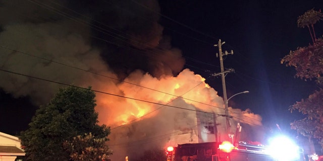 This photo provided by @seungylee14 shows the scene of a fire in Oakland, early Saturday, Dec. 3, 2016.