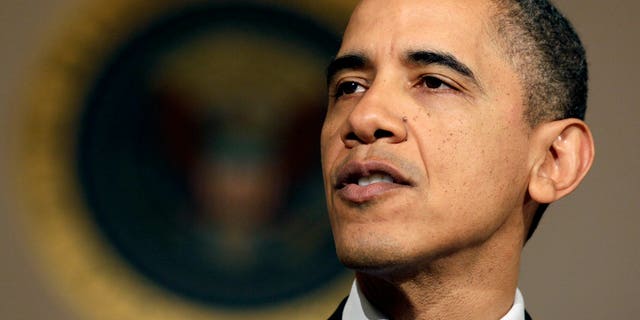 President Barack Obama makes a statement on the resignation of Egypt's President Hosni Mubarak in the Grand Foyer at the White House in Washington, Friday, Feb. 11, 2011. (AP)