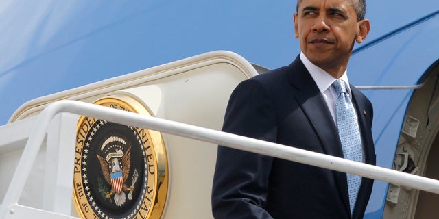 May 10: President Obama boards Air Force One at Andrews Air Force Base, Md.