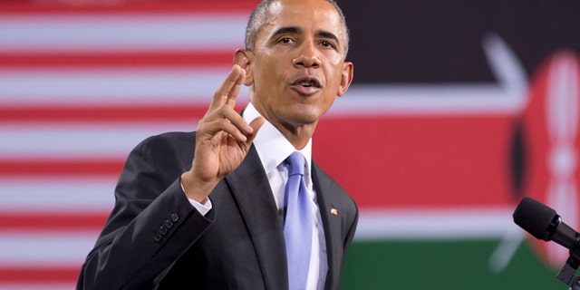 July 26, 2015: President Barack Obama delivers a speech, in front of American and Kenyan flags, at the Safaricom Indoor Arena in the Kasarani area of Nairobi, Kenya. Obama is traveling on a two-nation African tour where he will become the first sitting U.S. president to visit Kenya and Ethiopia.