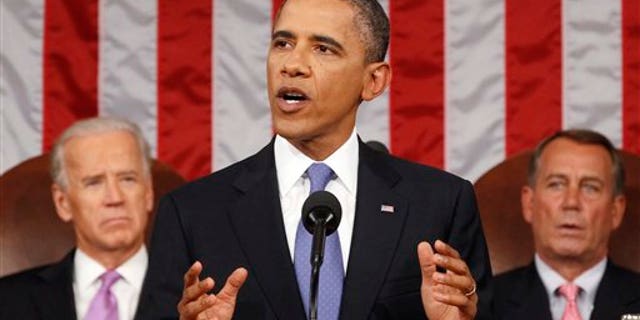Sept 8: President Barack Obama delivers a speech to a joint session of Congress at the Capitol in Washington. Watching are Vice President Joe Biden and House Speaker John Boehner.