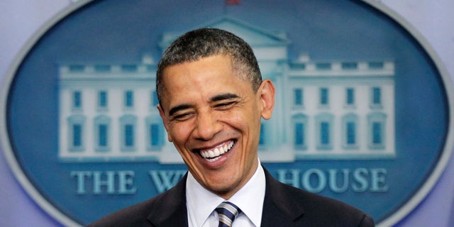 In this April 27, 2011, file photo President Obama laughs as comments to reporters on the controversy over his birth certificate and true nationality in the White House briefing room in Washington. (AP)