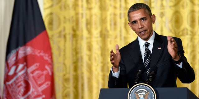 President Barack Obama speaks during a joint news conference with Afghanistan's President Ashraf Ghani, Tuesday, March 24, 2015, in the East Room of the White House in Washington. President Barack Obama said the U.S. will keep just under 10,000 troops in Afghanistan through the end of 2015 at the request of Afghanistan's new president, Ashraf Ghani. (AP Photo/Susan Walsh)