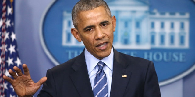 FILE -- Former President Barack Obama speaks to journalists as he participates in his last news conference of the year at the White House in Washington, U.S., December 16, 2016.