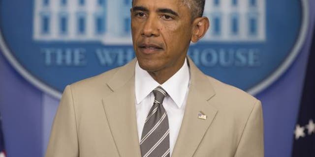 Former President Barack Obama's choice of a tan suit did not go over well in Washington in 2014.