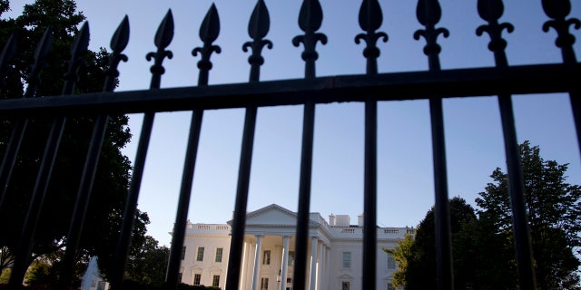 FILE - In this Sept. 22, 2014, file photo, the White House is photographed from Pennsylvania Avenue in Washington.