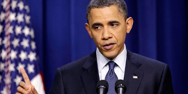 President Obama answers a question during a press conference on the White House complex in Washington, Friday, March 11, 2011. (AP)
