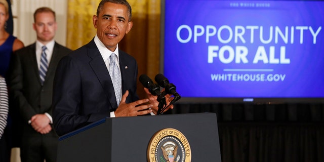 June 9, 2014: President Obama speaks before he signs a presidential memorandum on reducing the burden of student loan debt in the East Room of the White House.