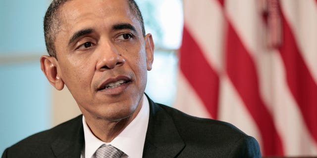 President Obama speaks to members of the media during a Cabinet meeting in the Cabinet Room of the White House in Washington, Wednesday, Aug., 3, 2011.