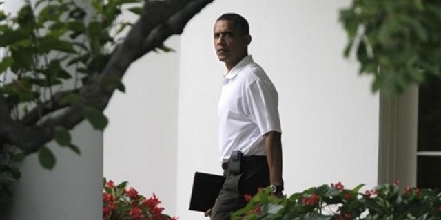 Saturday: President Obama leaves the Oval Office of the White House on his way to play golf at Andrews Air Force Base.