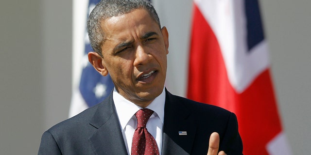 March 14, 2012: President Barack Obama answers a question during a joint news conference with British Prime Minister David Cameron of the Rose Garden at the White House in Washington.