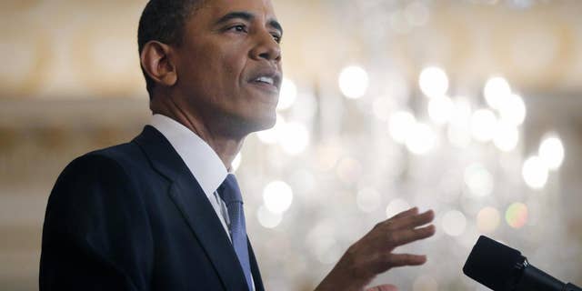 President Barack Obama delivers a policy address on events in the Middle East at the State Department in Washington, Thursday, May 19, 2011. (AP Photo/Charles Dharapak)