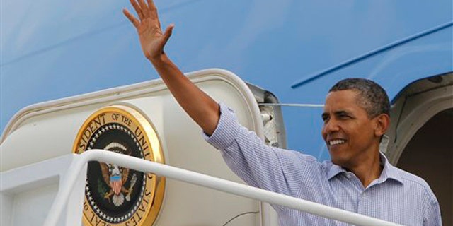 President Obama boards Air Force One at Andrews Air Force Base, Md., as he travels to Paterson, N.J., on Sept. 4.