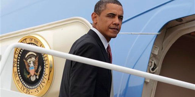 President Obama boards Air Force One at Andrews Air Force Base, Md., June 23 en route to New York.