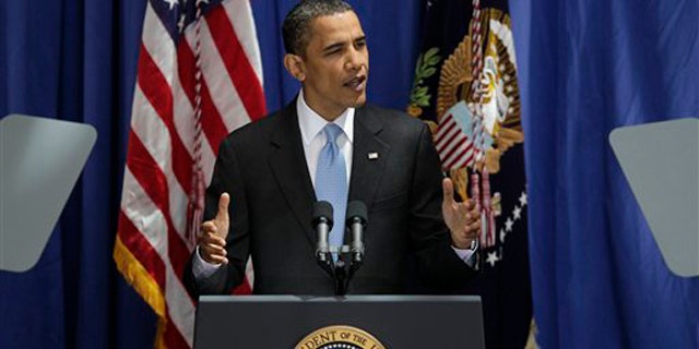 President Obama talks about an immigration policy overhaul during a speech at American University in Washington July 1. (AP Photo)