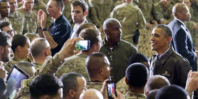 May 25, 2014: President Obama greets troops at Bagram Airfield, north of Kabul, Afghanistan, during an unannounced visit.