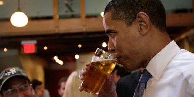 FILE: President Obama, who takes a sip of beer at 2011 event, is the first president to brew beer in the White House.