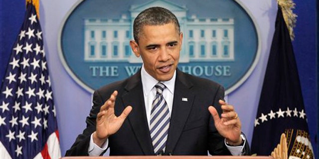 Wednesday: President Obama gestures while speaking to reporters about the controversy over his birth certificate.
