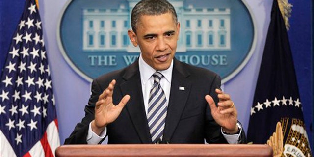 Wednesday: President Obama gestures while speaking to reporters about the controversy over his birth certificate.