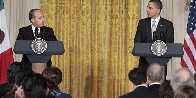President Obama, accompanied by Mexican President Felipe Calderon, makes an opening statement during their joint news conference March 3 in the White House.