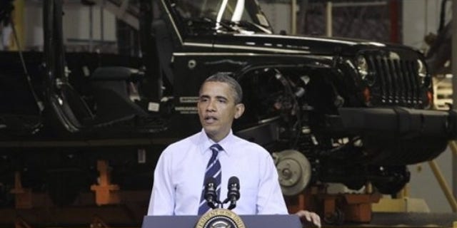 President Obama speaks at Chrysler Group's Toledo Assembly complex in front of a Jeep Wrangler, Friday, June 3, 2011, in Toledo, Ohio.