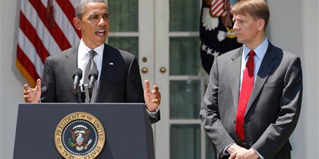 President Obama announces the nomination of former Ohio Attorney General Richard Cordray, right, to serve as the first director of the Consumer Financial Protection Bureau July 18 in Washington.
