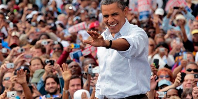 President Obama waves to supporters during a Labor Day speech Sept. 5 in Detroit.