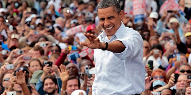 President Obama waves to supporters during a Labor Day speech Sept. 5 in Detroit.