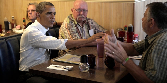 July 24, 2012: President Obama talks with veterans at the Gateway Breakfast House in Portland, Ore.